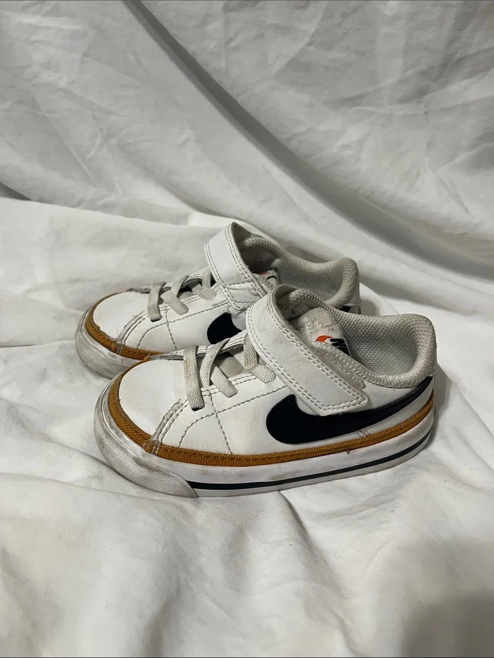 Nike Court Legacy Kids White Sneakers with Black Swoosh and Tan Accent